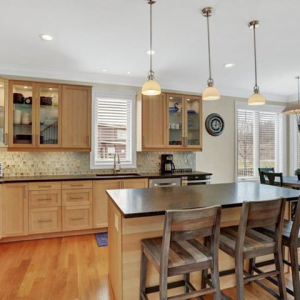We can't decide! If you could have your choice, which would you add to your kitchen? A large kitchen island, new cabinets or beautiful granite countertops? photo